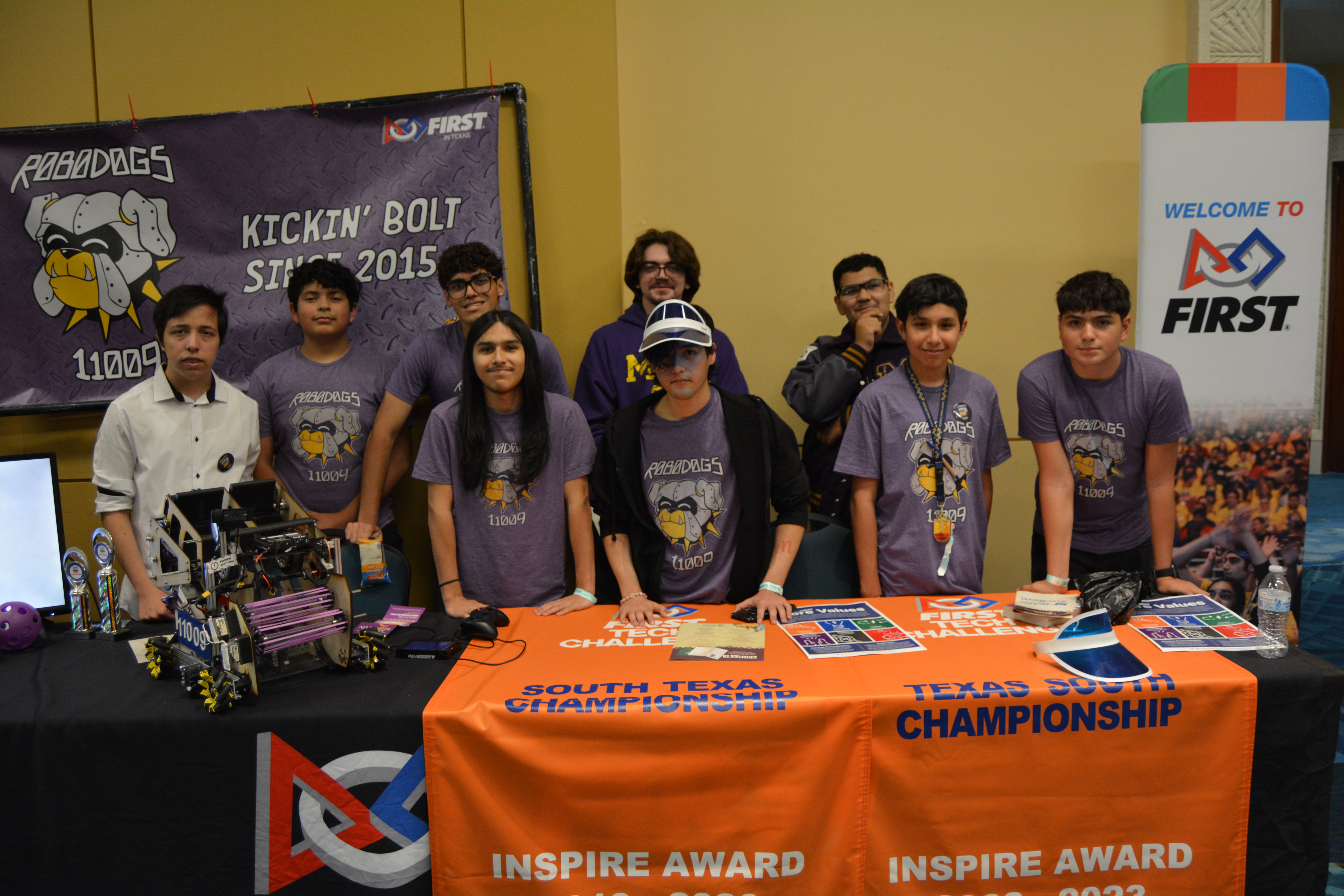 Robodogs teammates together at an event